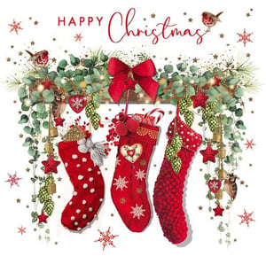 a christmas card with three red stockings hanging from a wreath .