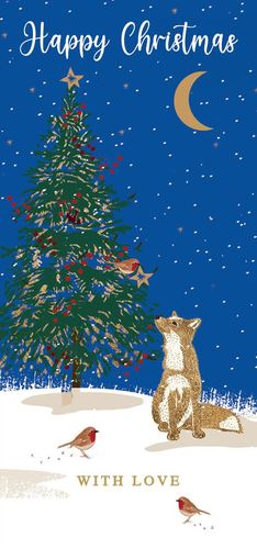 a fox is sitting in front of a christmas tree with birds .