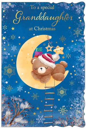 a christmas card with a teddy bear sleeping on the moon