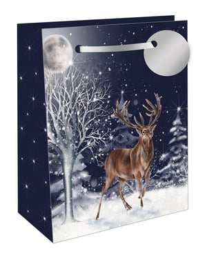 a christmas gift bag with a deer in the snow