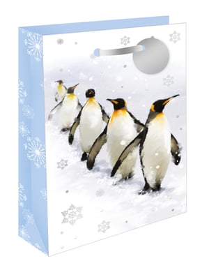 a gift bag with penguins and snowflakes on it