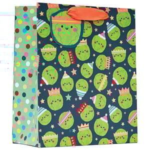a gift bag with a pattern of green cactus wearing party hats
