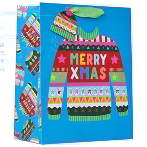 a blue gift bag that says merry xmas on it