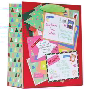 a stack of christmas cards with one that says dear santa i can explain