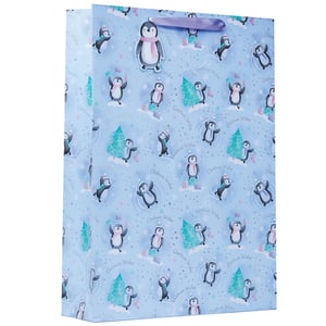 a blue gift bag with penguins and christmas wishes on it