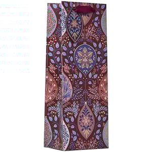 a robin is sitting on a branch in the snow on a christmas card .