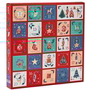 a red box with a nutcracker and a christmas tree on it