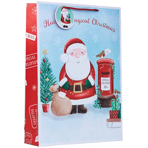 a christmas gift bag that says magical christmas on it