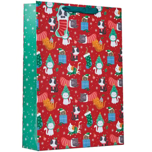 a red christmas bag with cats and stockings on it