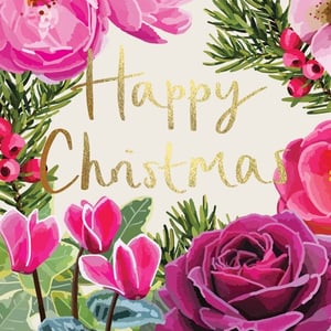 a christmas card with pink flowers and the words happy christmas