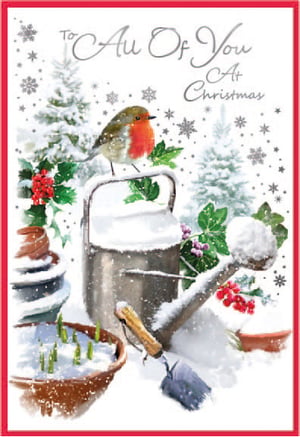 a christmas card with a bird on a watering can