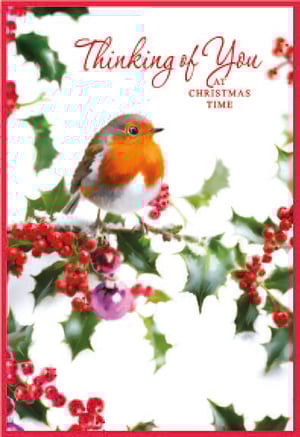 a christmas card that says thinking of you at christmas time