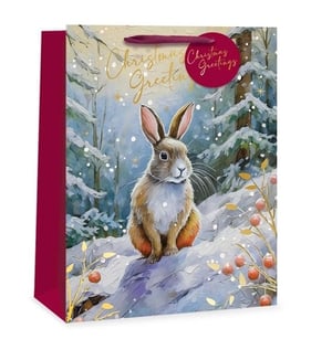 a christmas greetings bag with a rabbit on it