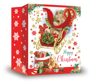 a christmas bag with a teddy bear in a sleigh and the words happy christmas