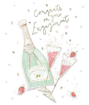 congratulations on your engagement card with a bottle of champagne and two glasses of champagne .