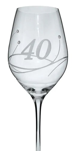 a wine glass with the number 40 engraved on it .