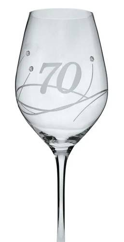 a wine glass with the number 70 engraved on it