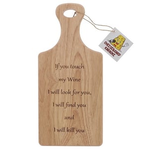 a wooden cutting board with a tag that says cheeseboard karaoke