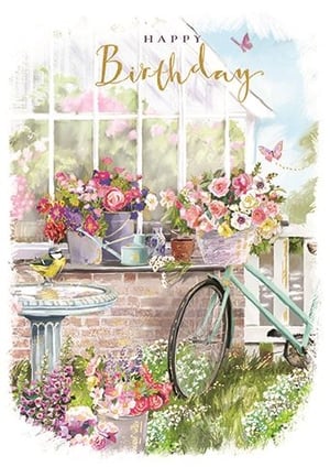 a birthday card with a bicycle and flowers in a garden .