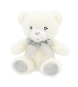 a white teddy bear with a grey bow around its neck