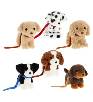 a group of stuffed dogs with leashes on them