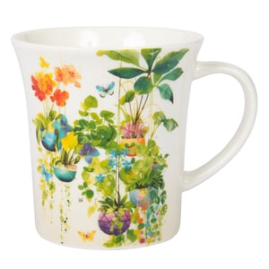 a white mug with flowers and butterflies on it