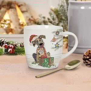 a mug with a dog in a santa hat on it