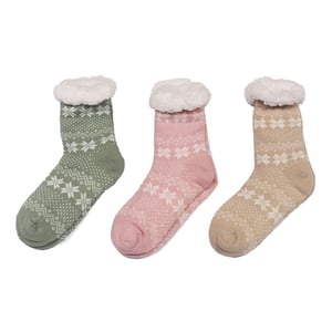 three different colored socks with snowflakes on them