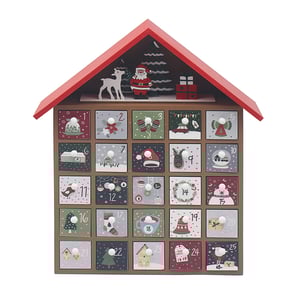 a wooden house shaped advent calendar with santa on top