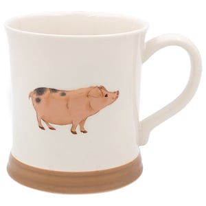 a white mug with a pig on it