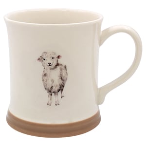 a white mug with a picture of a sheep on it