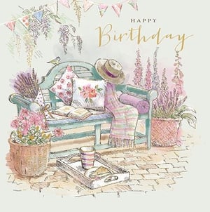 Celebrate a special day with our delightful 'Open Birthday Female' card from Ling. This enchanting design captures the essence of a peaceful garden retreat, perfect for sending warm wishes.
The charming watercolour illustration features a tranquil bench adorned with soft cushions, a cosy blanket, and a stylish sun hat, inviting relaxation. A tray with a cup and snack, alongside an open book, suggests a moment of quiet enjoyment. Lush lavender, elegant foxgloves, and delicate wisteria frame the scene, while a sweet bird adds a touch of nature.
With its gentle colours and serene atmosphere, this card is ideal for any female recipient who appreciates beauty and calm. Each pack contains 6 cards, ready to bring joy to your customers.