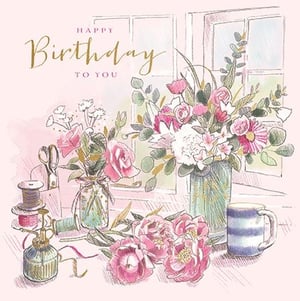 Celebrate her special day with this exquisite 'Open Birthday Female' card from Ling. Featuring a charming watercolour and sketch illustration, it depicts a serene window scene adorned with beautiful pink and white blooms, lush greenery, and delicate craft details. The elegant 'Happy Birthday To You' message in gold script adds a touch of sophistication. This card is perfect for any female recipient, offering a thoughtful and artistic way to send warm wishes. Supplied in a convenient pack of 6, it's a delightful addition to your greeting card selection, sure to appeal to customers seeking something special.