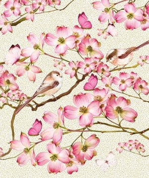 there are two birds sitting on a branch with pink flowers .