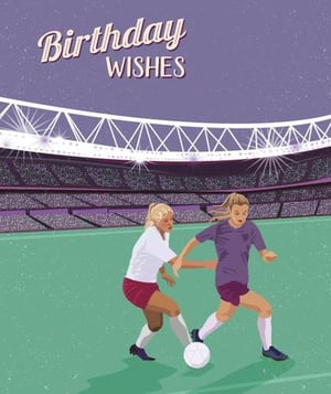 two women are playing soccer on a field in a stadium .