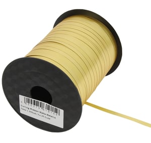 a spool of gold curling ribbon with a barcode on it