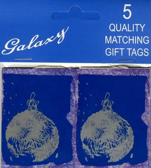 Add a touch of festive charm to your customers' gifts with these delightful 5 Bauble Gift Tags from International Greetings. Each retail pack contains five quality matching gift tags, perfect for Christmas presents or any special occasion.

Featuring a striking blue background with a beautifully detailed silver bauble design, these tags offer a classic yet contemporary look. The unique textured border adds an extra touch of elegance, making every gift feel extra special.

Supplied in a convenient pack size of 1x6, you'll receive six individual retail packs, ready for display. These eye-catching tags are sure to be a popular choice for anyone looking to elevate their gift-giving this season. Stock up now and bring some sparkle to your shelves!