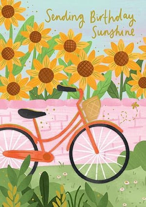 a birthday card with a bicycle and sunflowers on it .