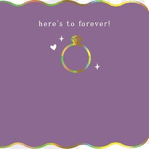 there is a ring with a diamond in it on a purple background .