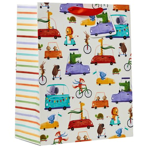 a gift bag with a pattern of animals riding cars
