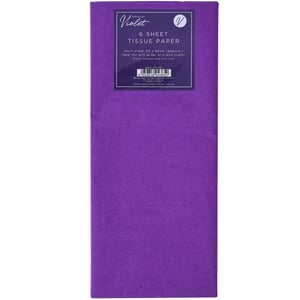 a sheet of purple tissue paper is sitting on a table .