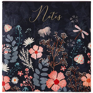 a notepad with flowers and butterflies on it