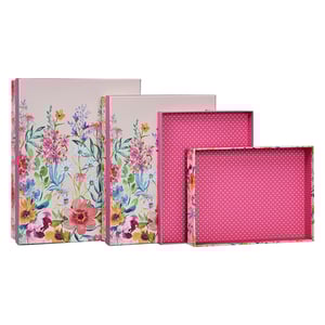a set of three pink boxes with flowers on them