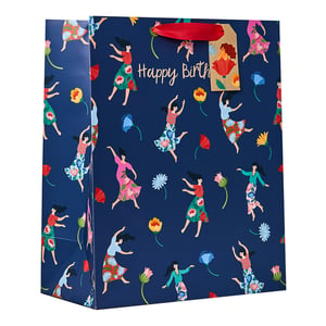 a gift bag that says happy birth on it