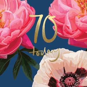 a 70th birthday card with pink and white flowers on a blue background .