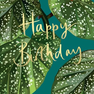 a birthday card with green leaves and the words happy birthday