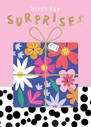 a birthday surprise card with a gift wrapped in flowers