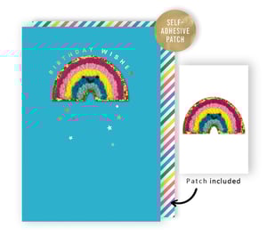 a birthday card with a patch of a rainbow on it
