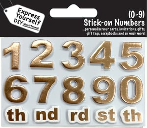 a package of gold stick-on numbers from express yourself diy