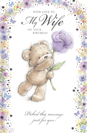 Offer your customers a delightful way to celebrate a special birthday with this "Wife" card from Simon Elvin. The design showcases an endearing teddy bear holding a lovely purple flower, framed by a soft watercolour border of pastel flowers and butterflies. The tender message, "WITH LOVE TO My Wife ON YOUR BIRTHDAY" and "Picked this message just for you," conveys warmth and affection. This card is an ideal choice for husbands looking to express their love. Supplied in a practical pack of 6, it's a thoughtful addition to your greeting card selection.